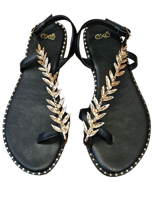 Sandalias planas negro rama dorada